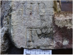 Initials HB and IW on exterior window sill